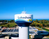 Lakeshore water tower with distinctive blue and white design